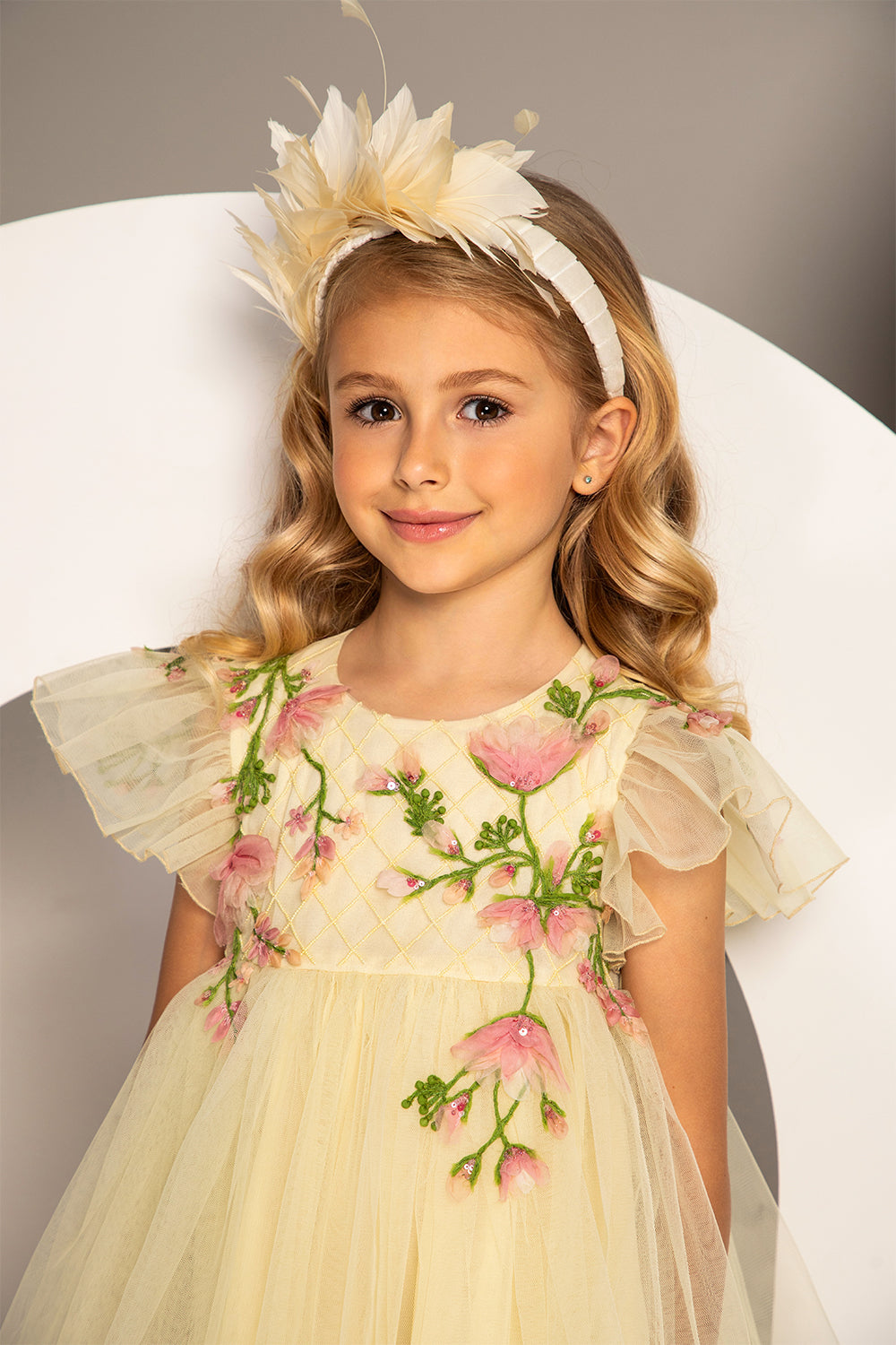 Pale yellow layered high-waist dress with hand-embroidred flowers