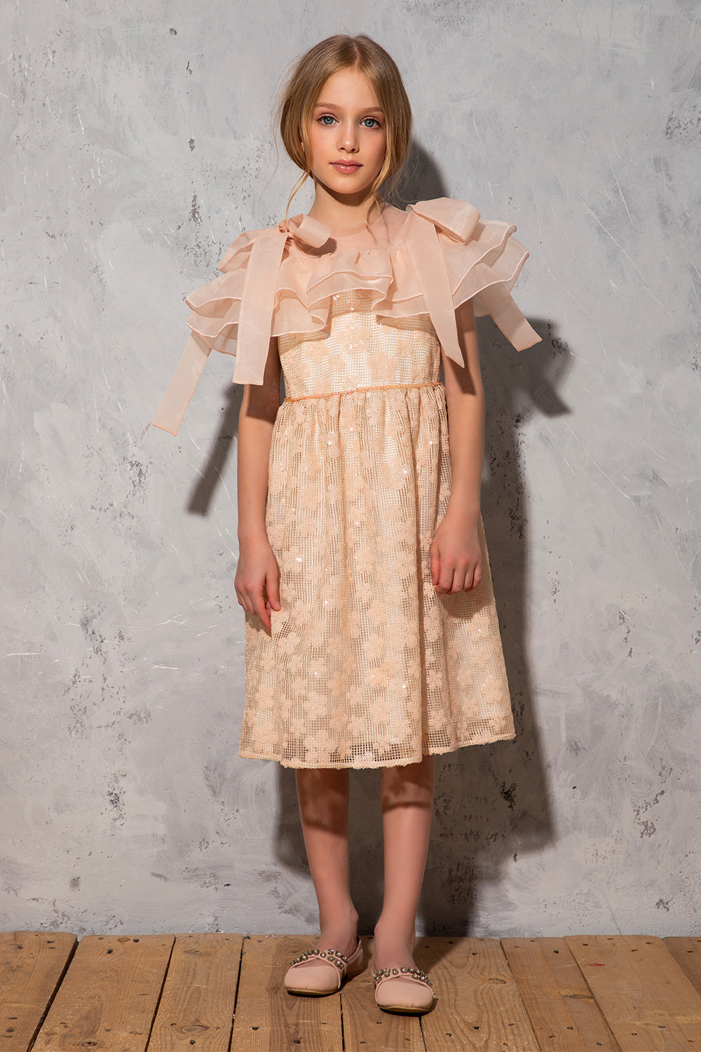 Peach floral lace dress with organza frills and shoulder bows