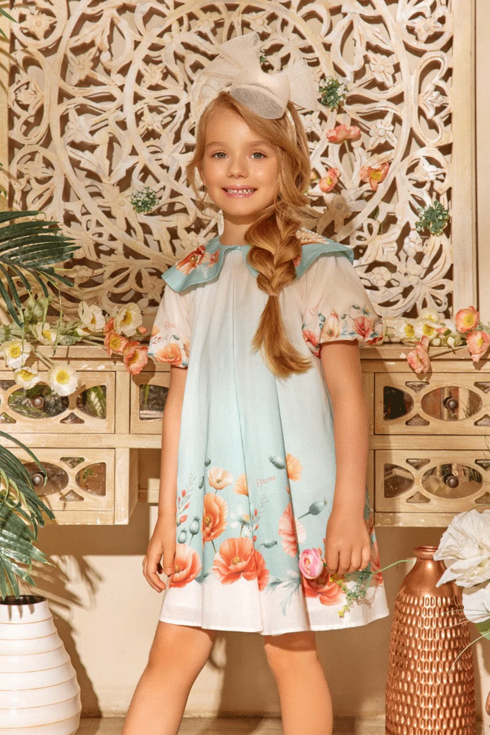 Ombré dress in soft aqua with floral print, puff sleeves, and a hand-embellished collar