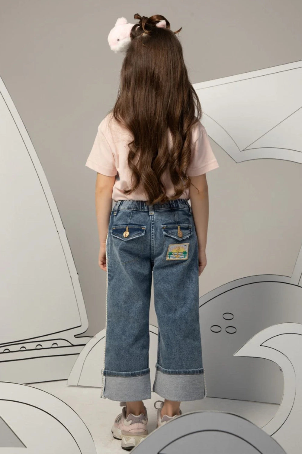 Wide-leg denim jeans with turned-up cuffs, side rope details