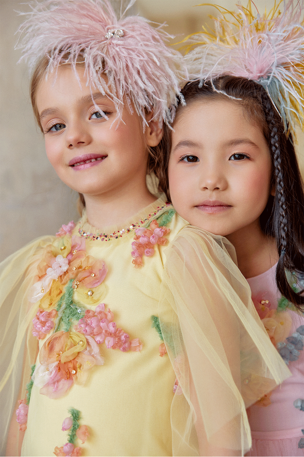 Yellow tulle dress with hand-embellished 3D flowers and tulle sleeves