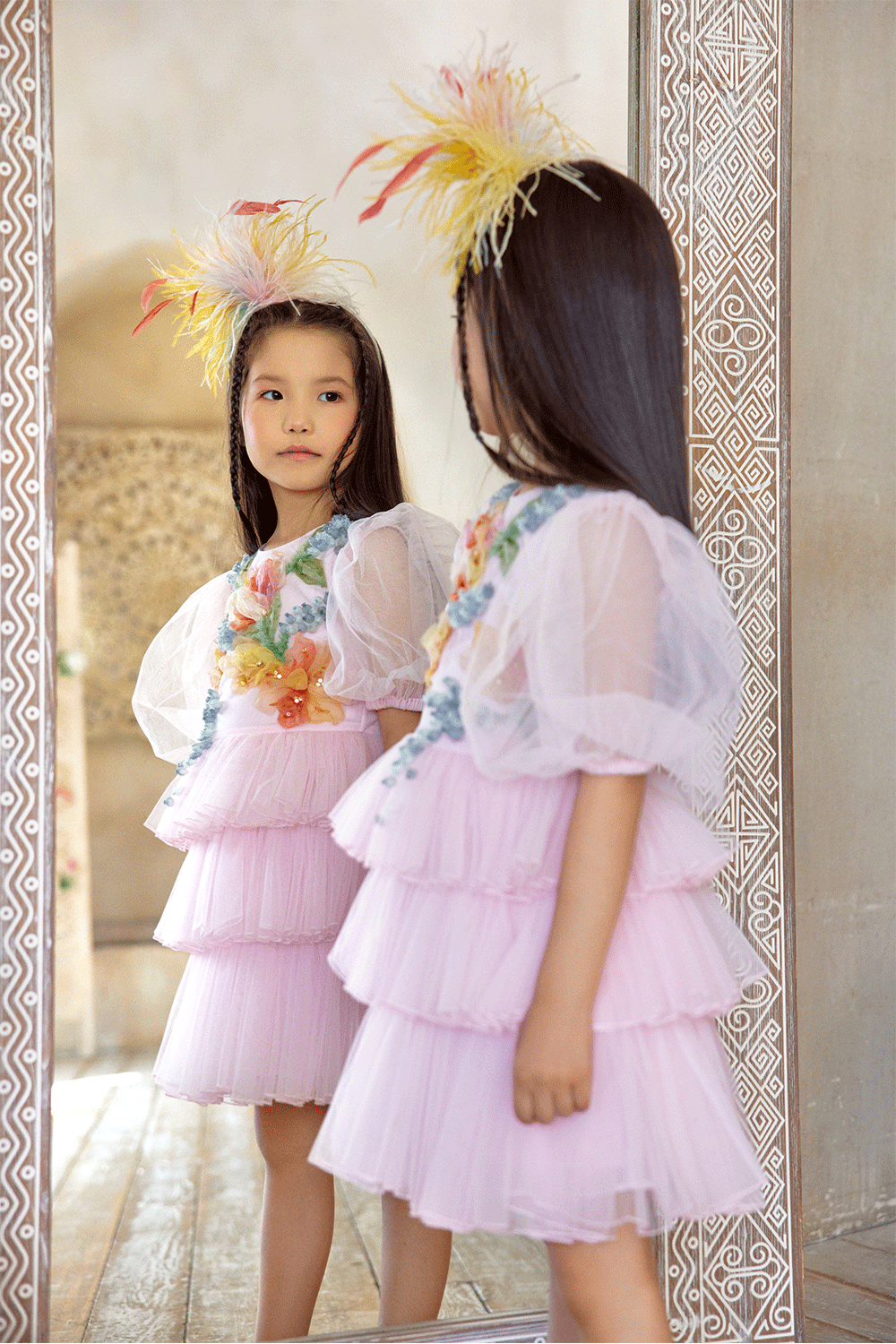 Pink tulle dress with puff sleeves and hand-embellished 3D flowers