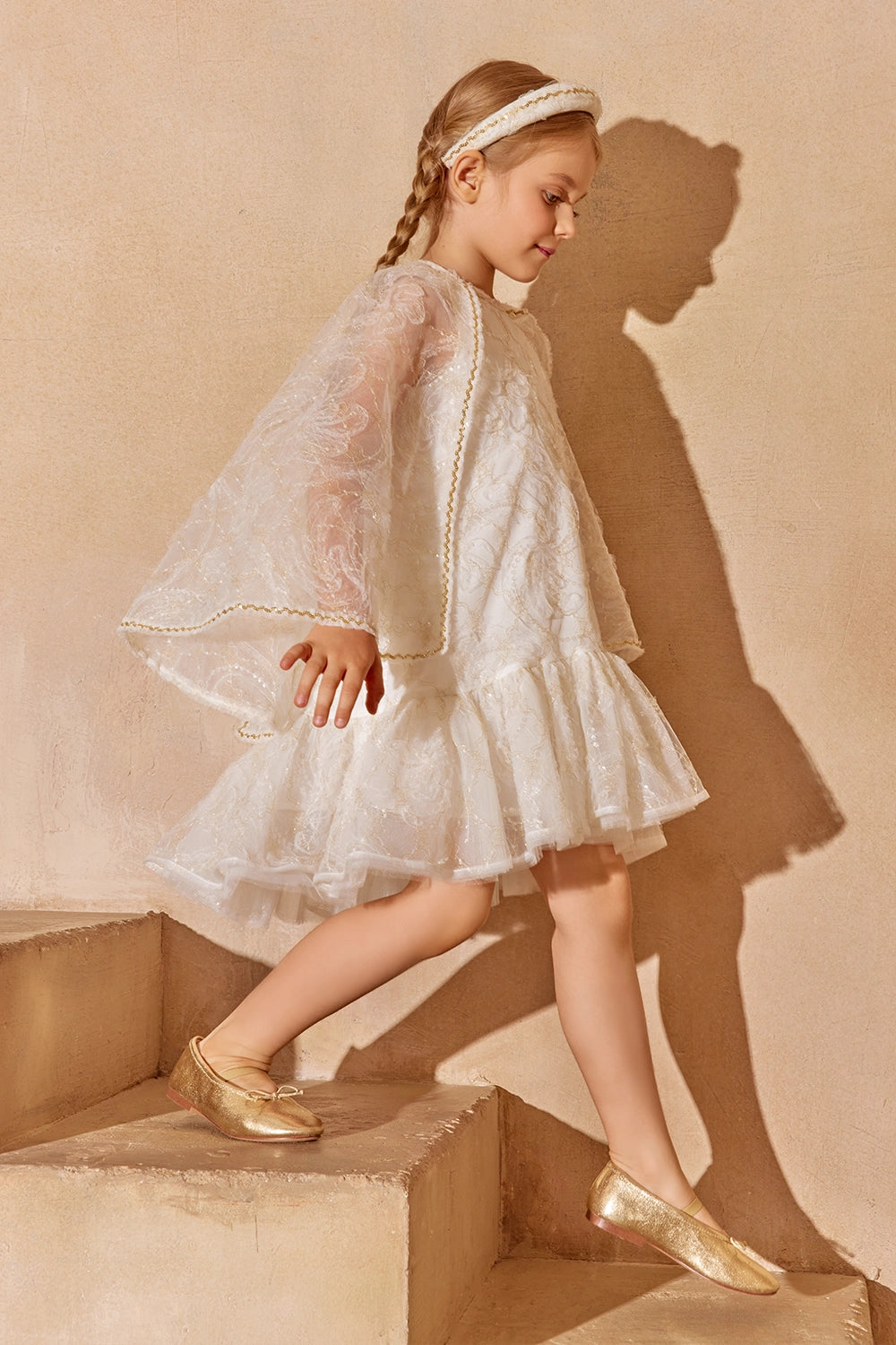 Ivory and gold lace dress with flared sheer cape sleeves