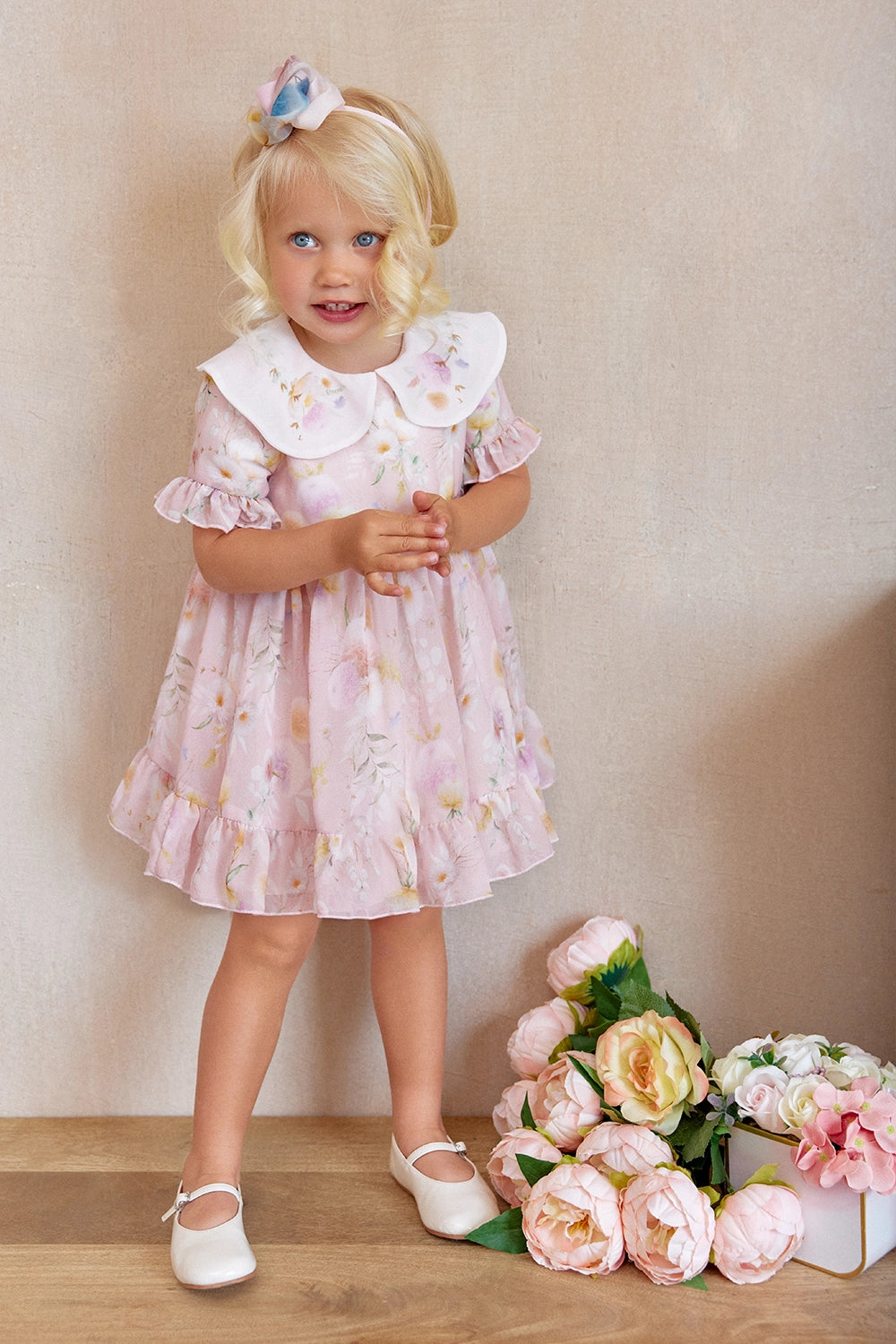Pink floral chiffon dress with short sleeves and white collar with flo
