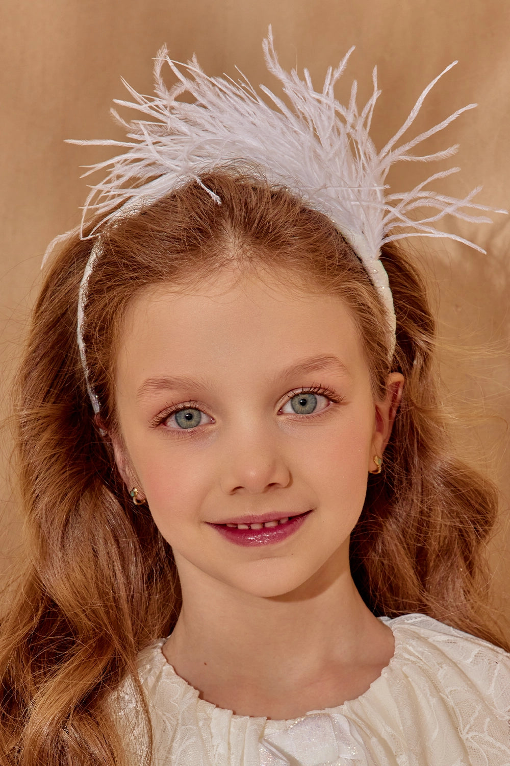 Off-white feather headband with soft shimmering velvet band