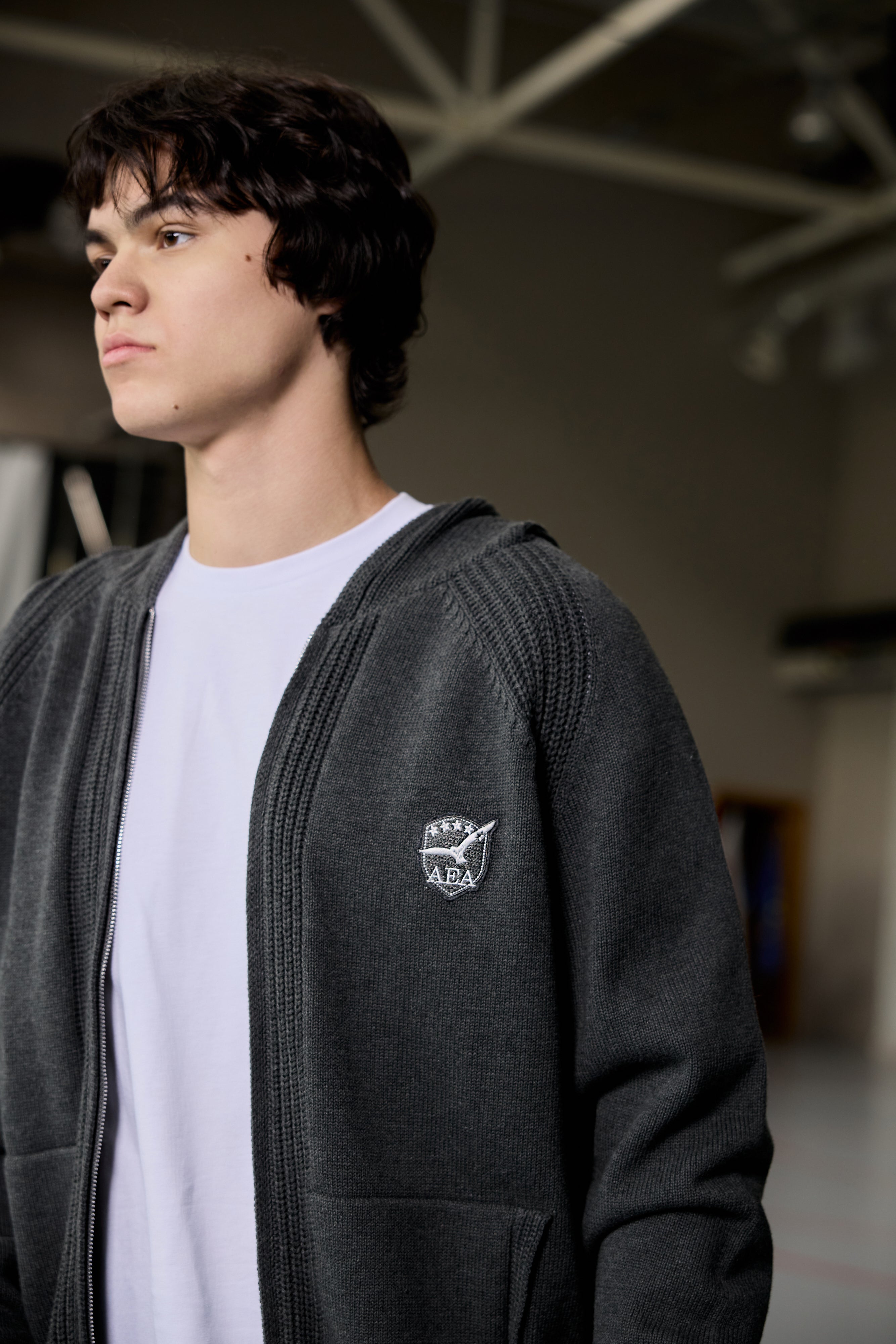 Grey zip-up hoodie for teen boys with ribbed texture