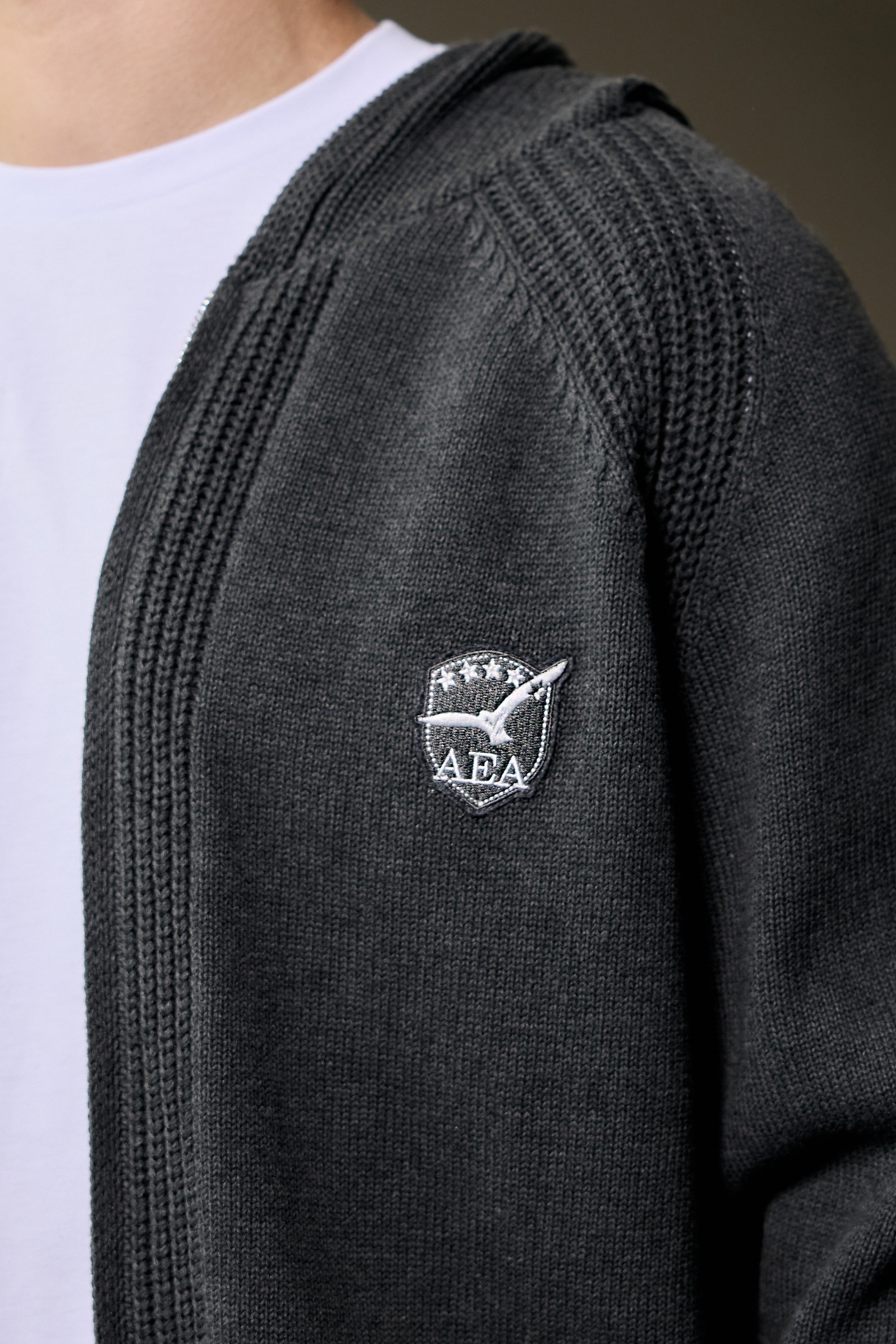 Grey zip-up hoodie for teen boys with ribbed texture