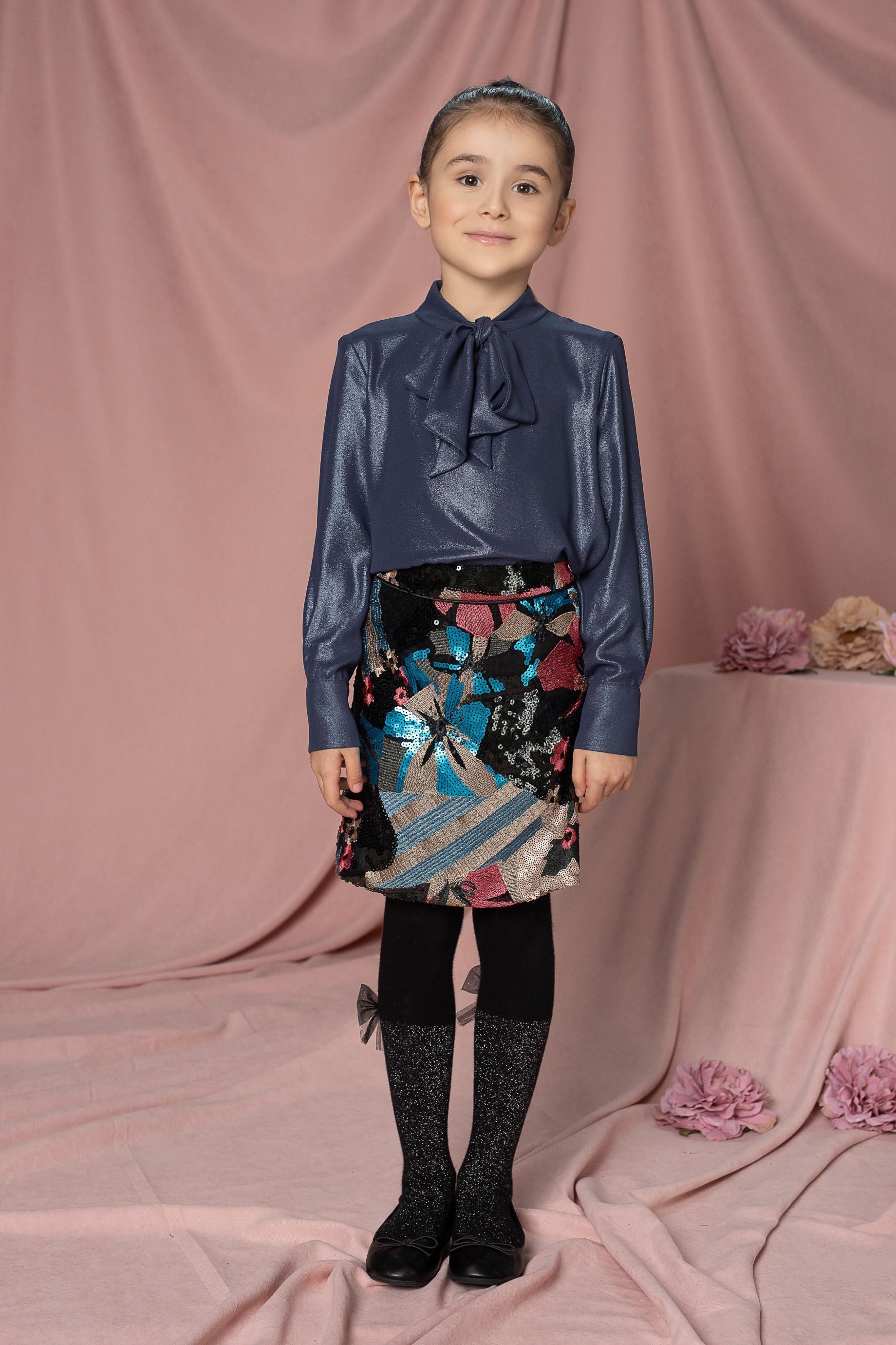 Blue shimmering shirt with bow