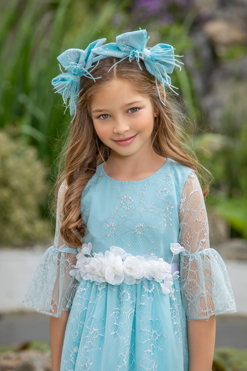Baby blue and silver lace dress with white flower