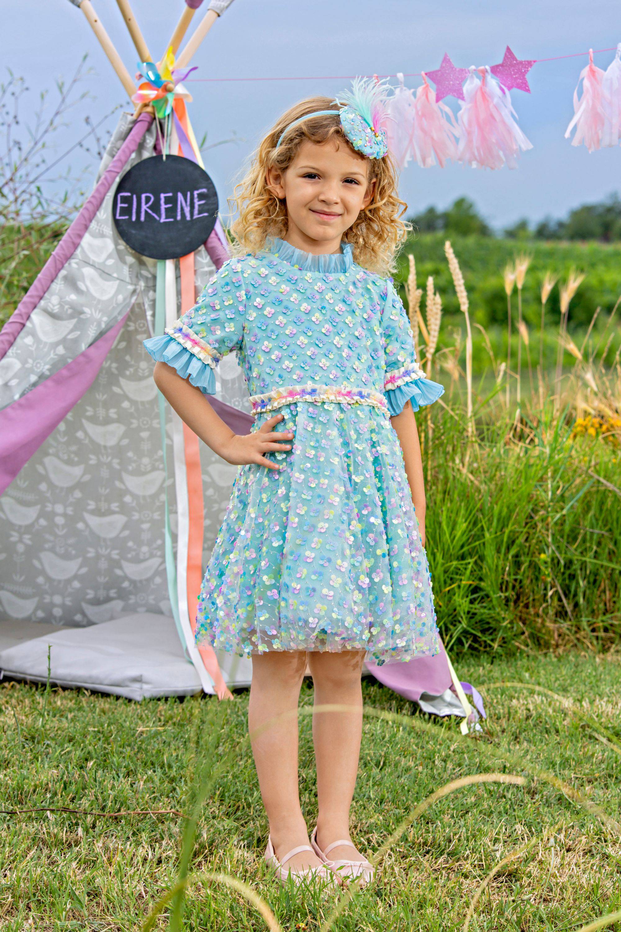 Blue sequin dress with chiffon frills