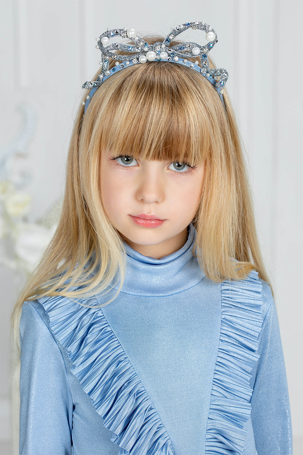 Shimmering light blue shirt with frills