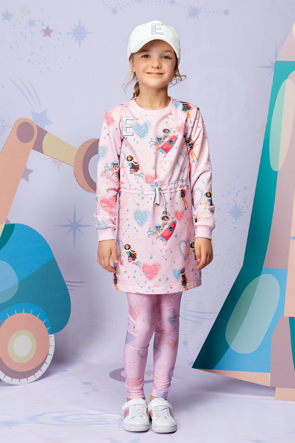 Pink Cosmic girls printed tunic with an adjustable waist