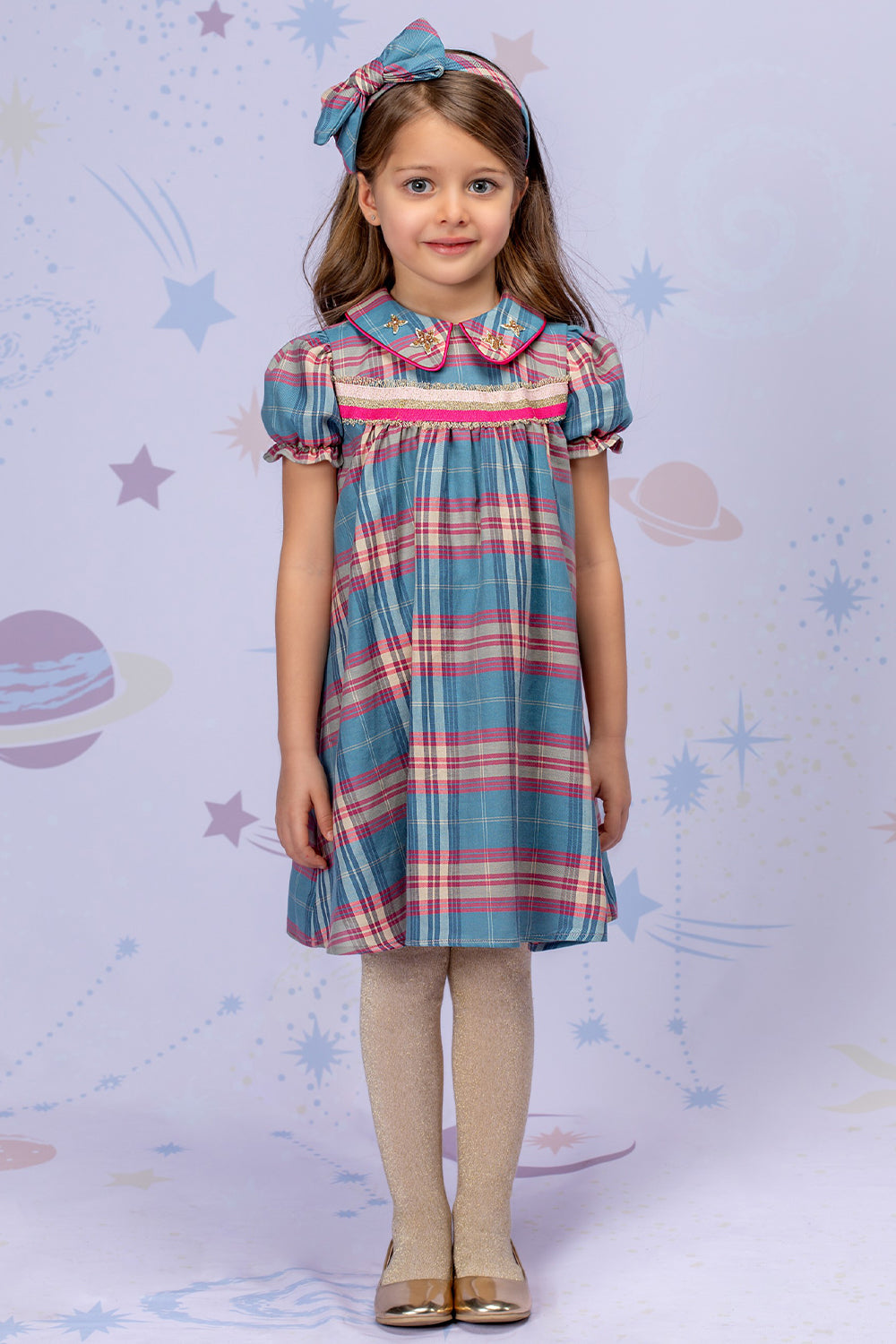 Fuchisa and blue plaid dress with a collar and handmade stars embellishments
