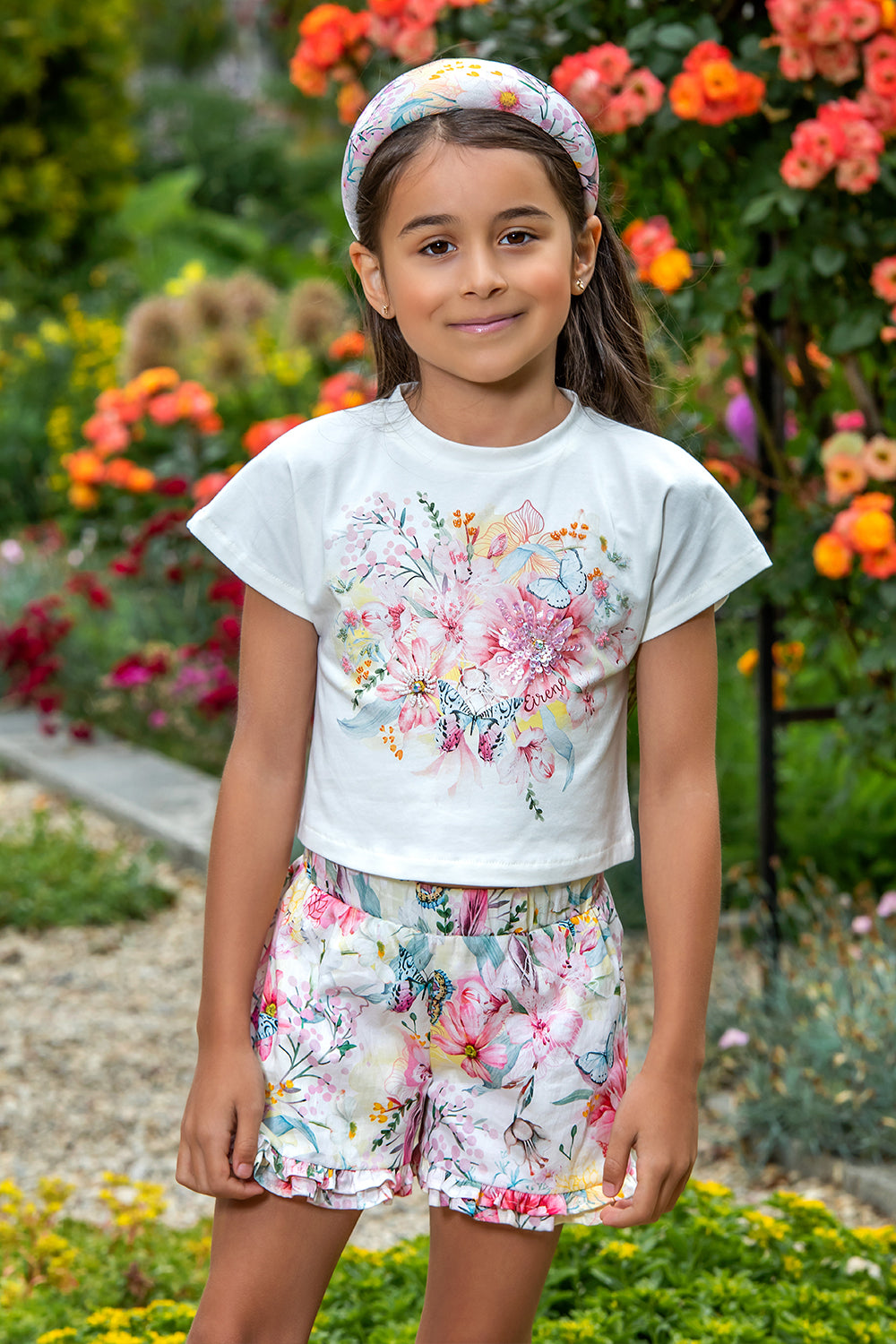 White floral t-shirt with hand-made embellishments