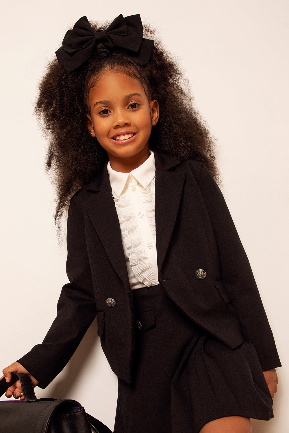 Black punto blazer with faux flap pockets and buttons