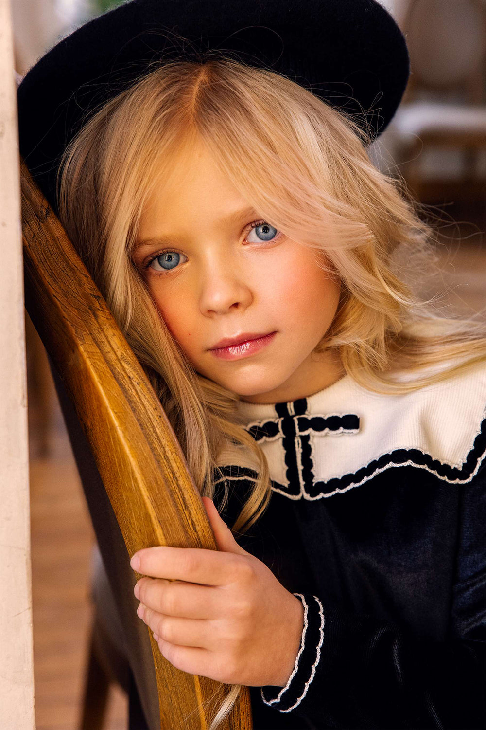 Black velvet dress with white corduroy collar and bow