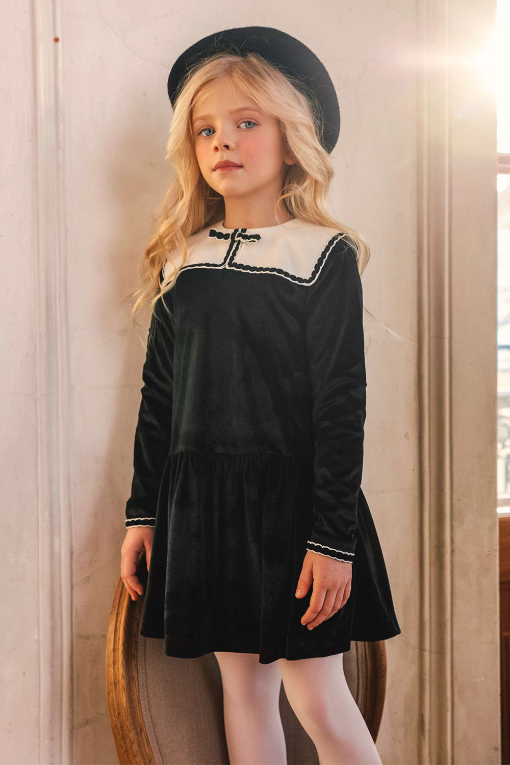 Black velvet dress with white corduroy collar and bow