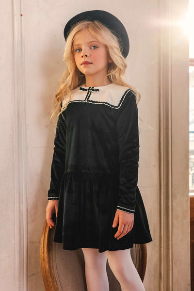 Black velvet dress with white corduroy collar and bow
