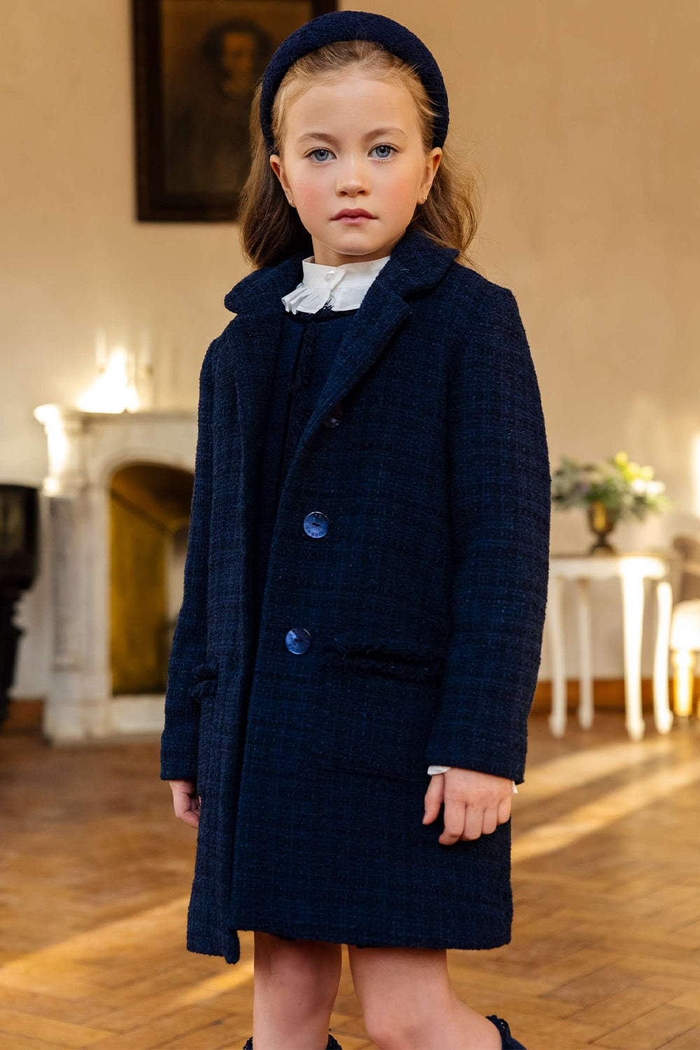 Blue tweed cotton blend coat with blue branded mother of pearl buttons