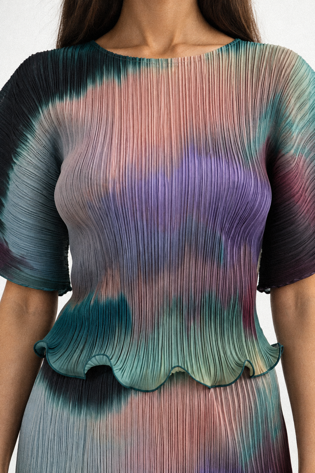 ARIA cropped pleated top in an abstract petrol and violet print - close-up