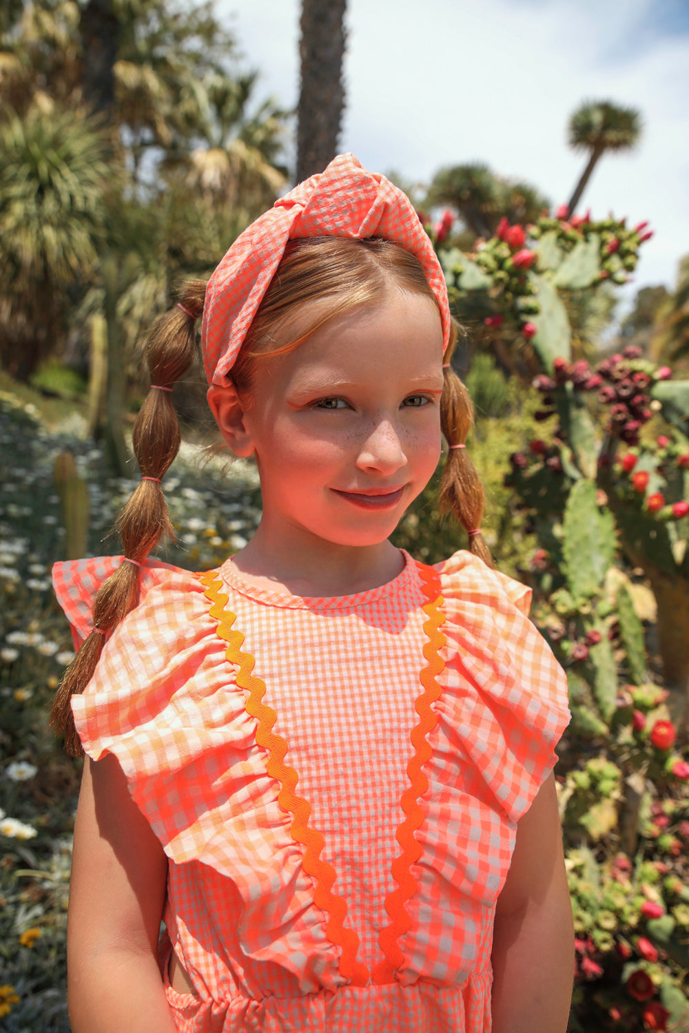 Coral neon and ecru cotton dress with frills