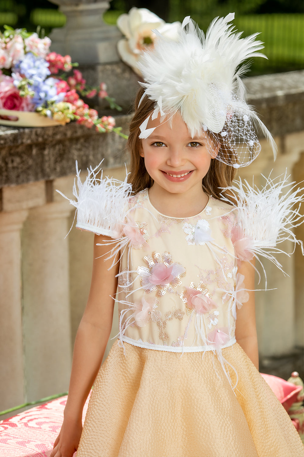 Cream jacquard organza dress with hand-embellished sequin floral lace upper part and white feathers on the sleeves