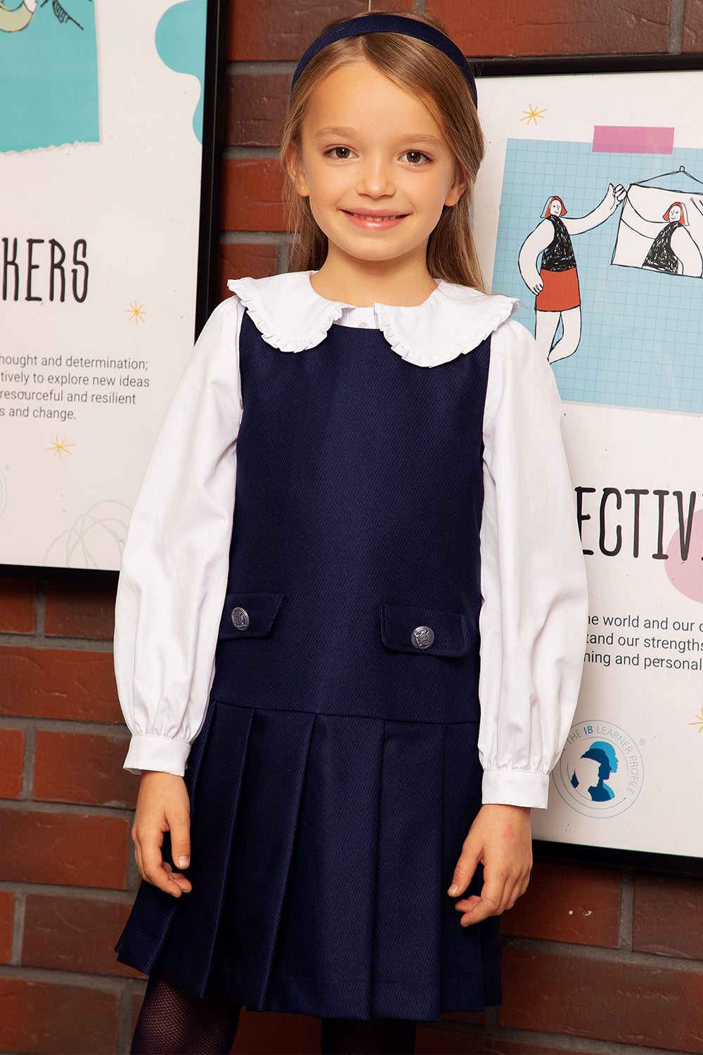 Dark blue dress with pleated skirt and buttons