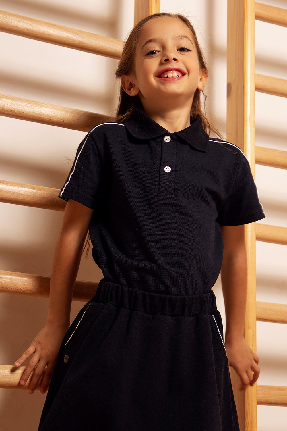 Dark blue polo t-shirt with white piping