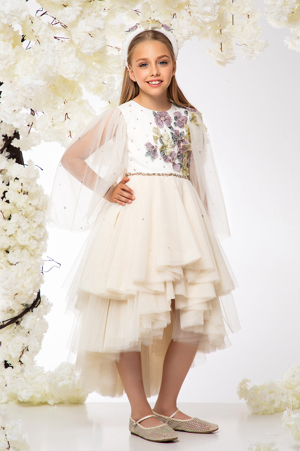 Ivory asymmetrical tulle layered dress with hand-embellished flowers, pearls and crystals and embellished waistline