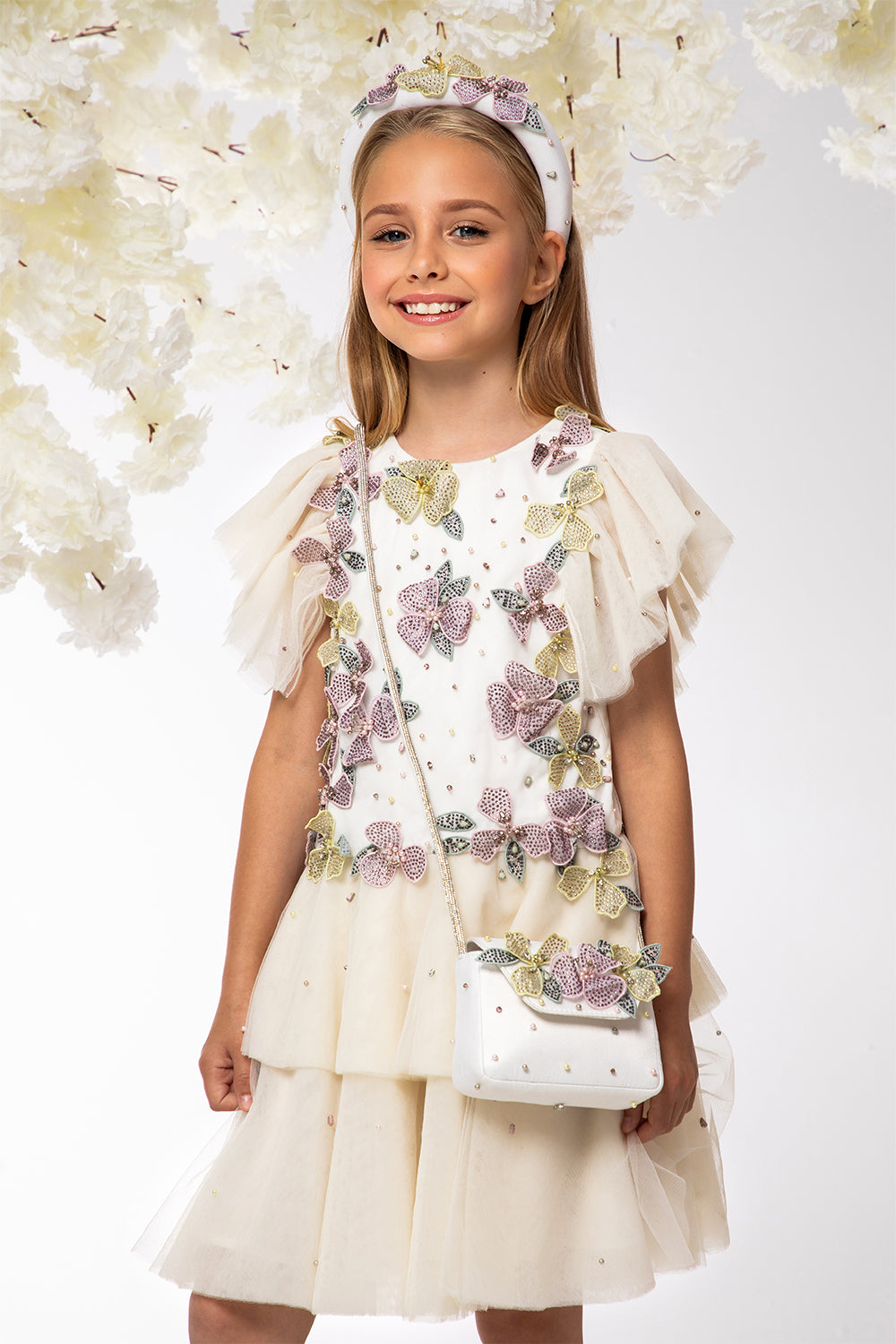 Ivory low waist tulle layered dress with hand-embellished flowers, pearls and crystals