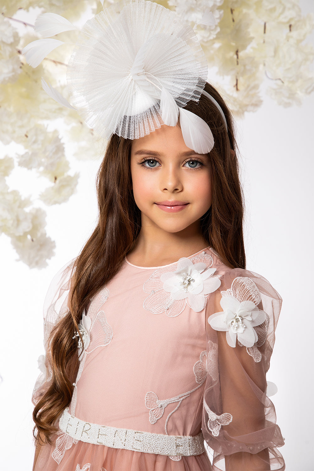 Powder pink tulle dress with white 3D flowers, pearls and crystals hand-embellishments and EIRENE waistline