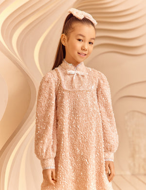 Powder pink sequin glittery dress with bow and fringes