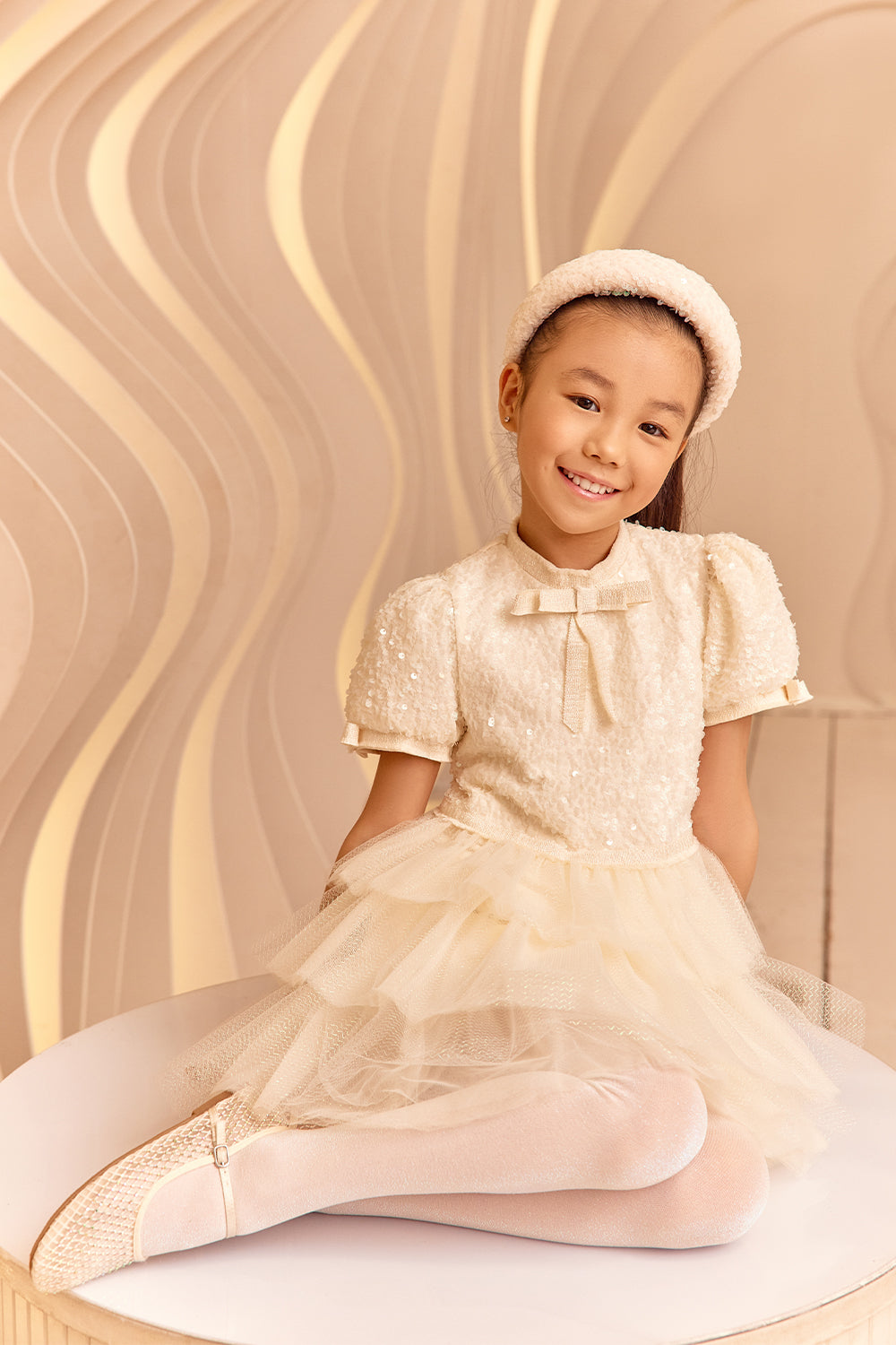 Ivory sequin and tulle glittery dress with bows