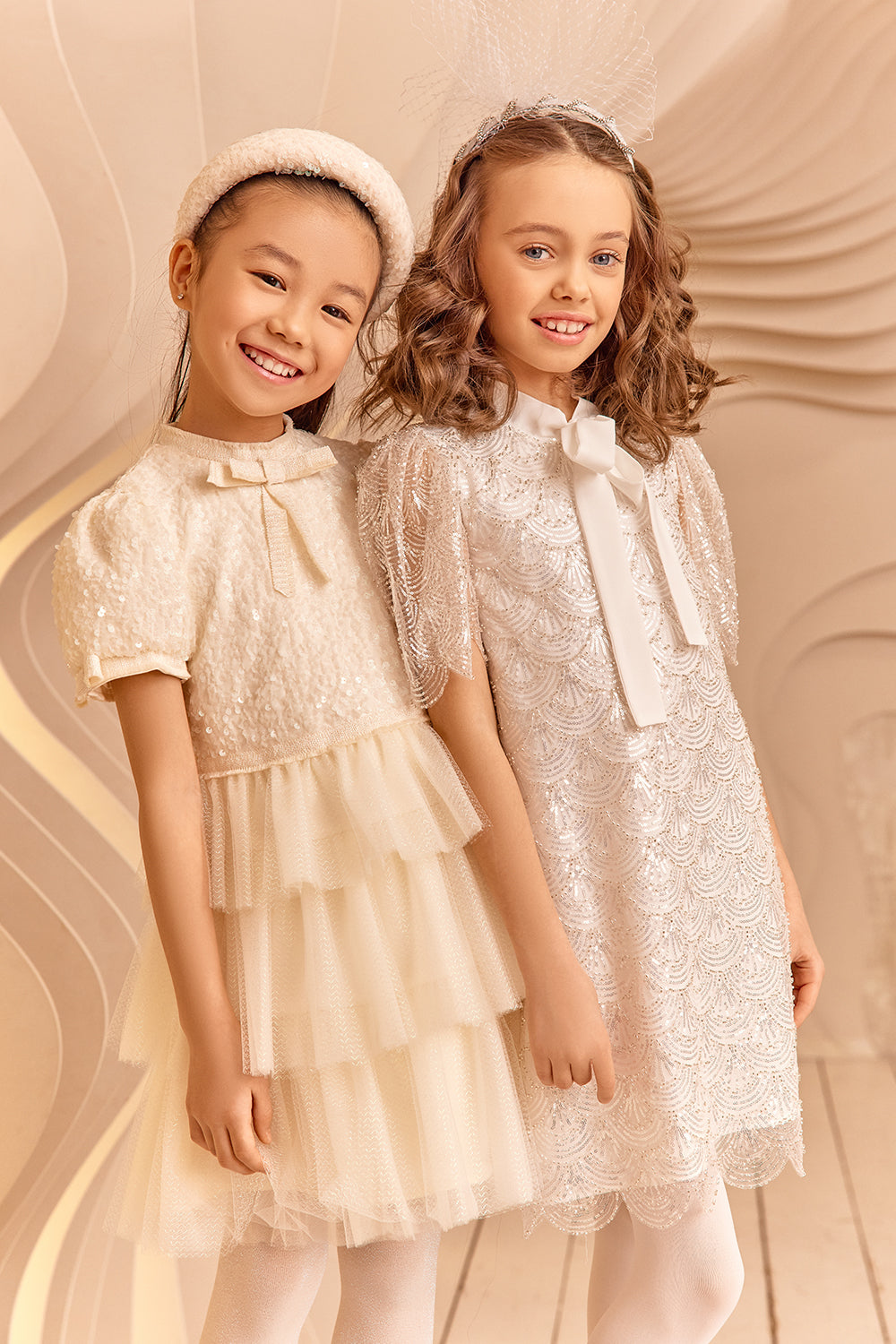 Ivory sequin and tulle glittery dress with bows