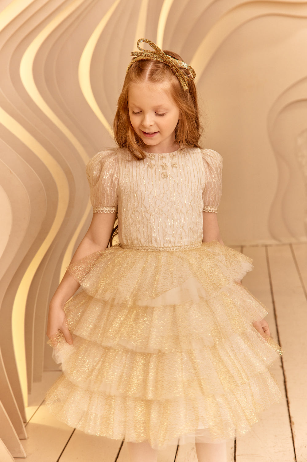 Ivory and gold threads dress with golden tulle frills
