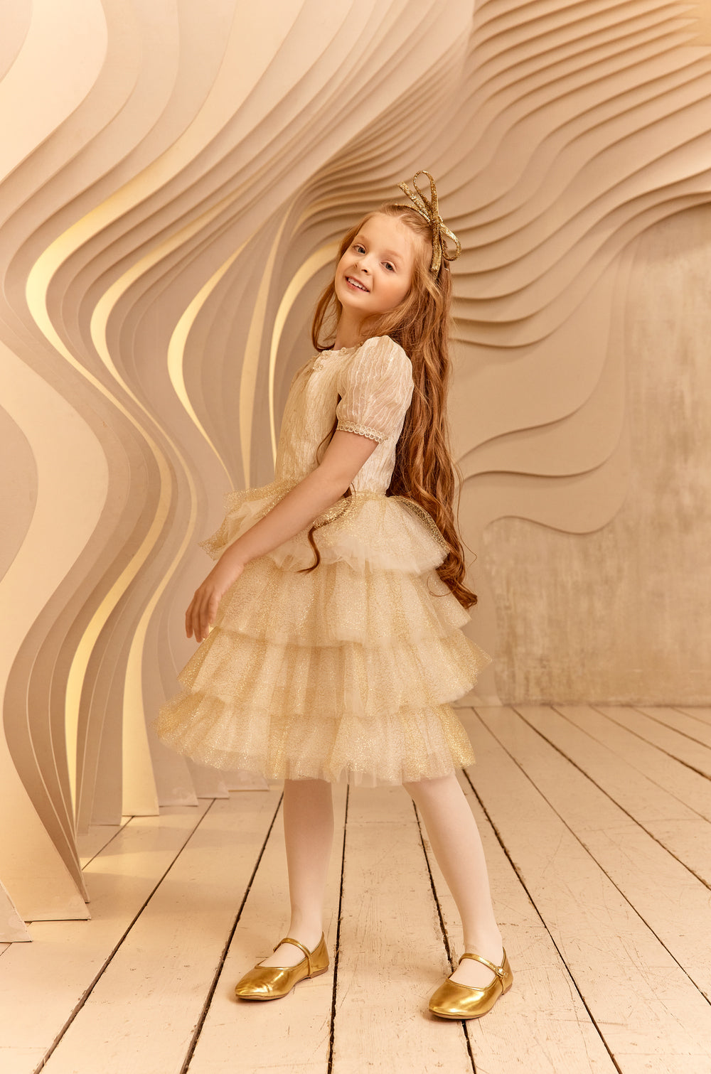 Ivory and gold threads dress with golden tulle frills