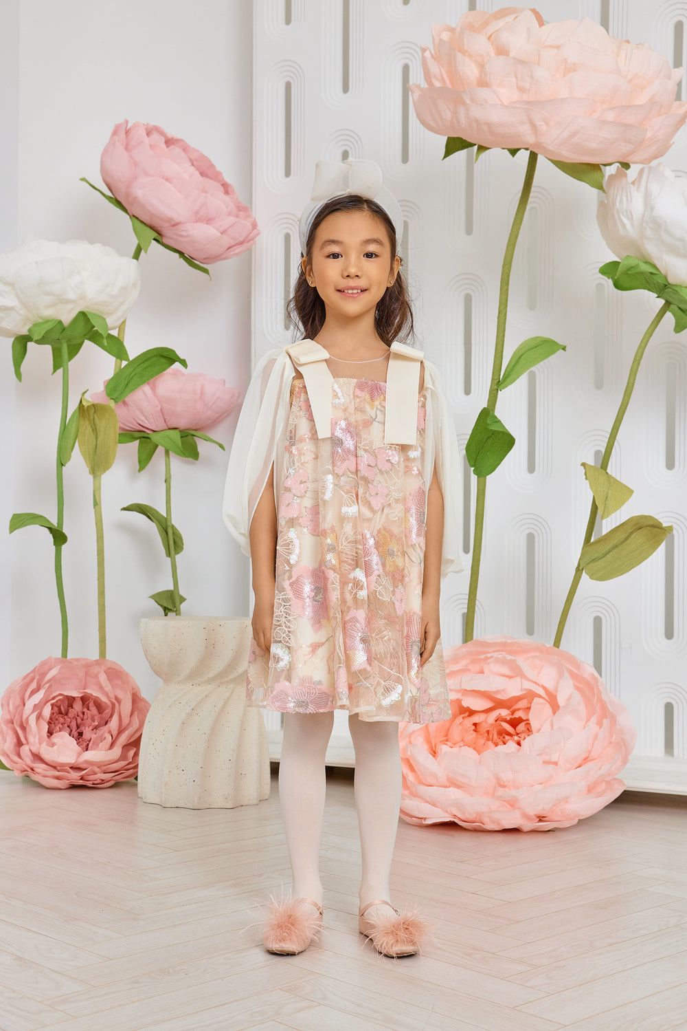 Pink and ivory sequin floral lace dress with ivory chiffon sleeves and velvet bows