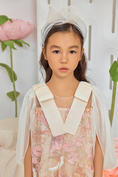 Pink and ivory sequin floral lace dress with ivory chiffon sleeves and velvet bows