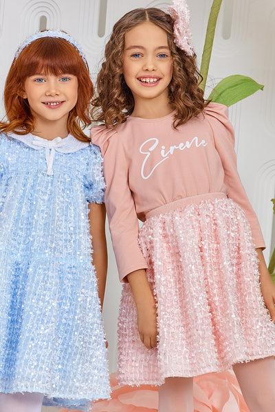 Pink t-shirt with glittery logo and puffed sleeves