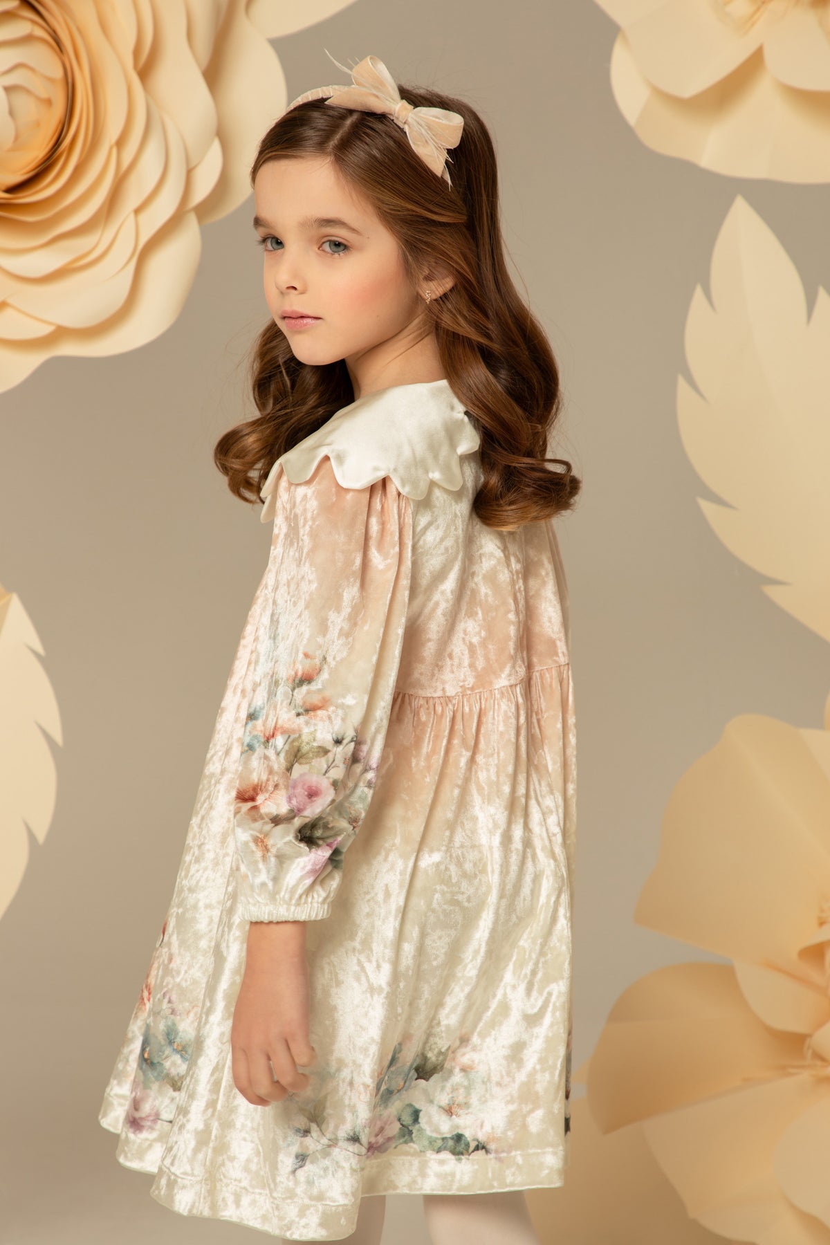 Side view of the velvet dress and puffed sleeves