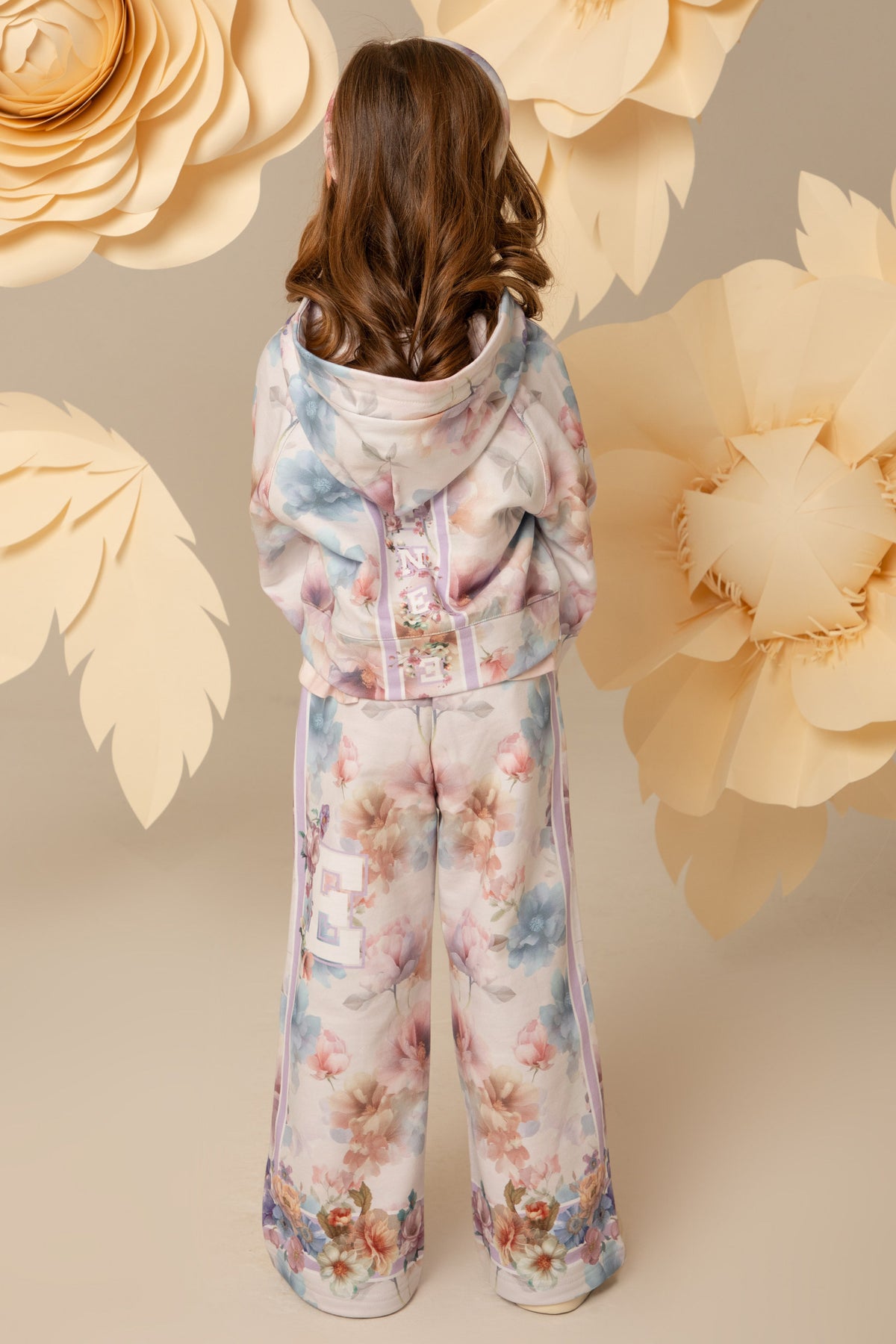 Back view of the floral hoodie and trouser set