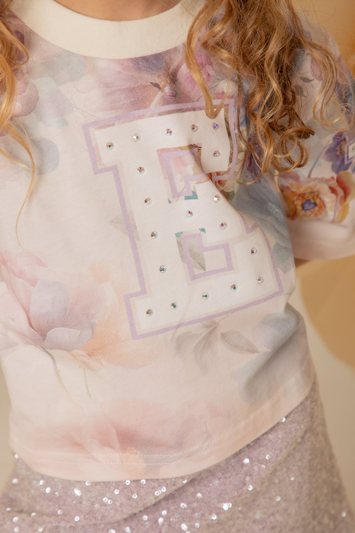 Close-up of the crystal embellishment and cotton jersey