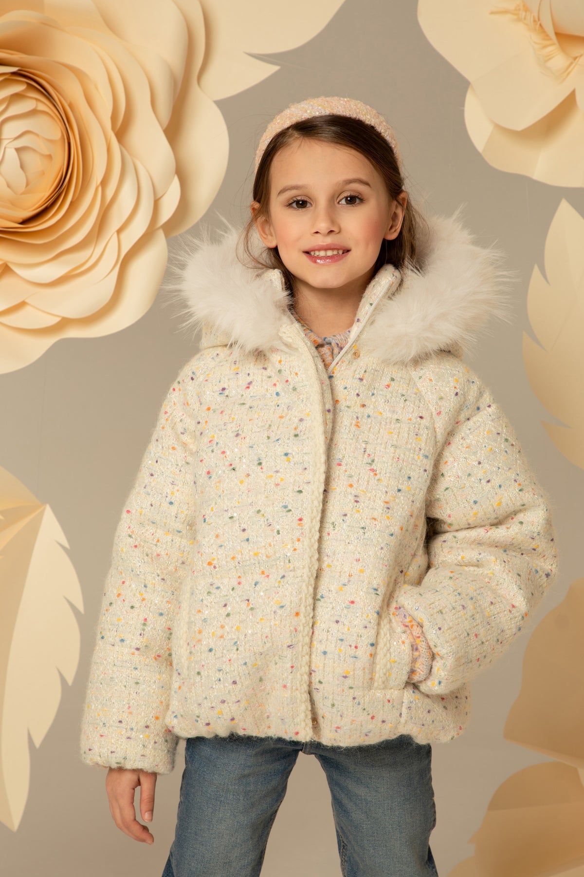 Ivory tweed down jacket seen from the front