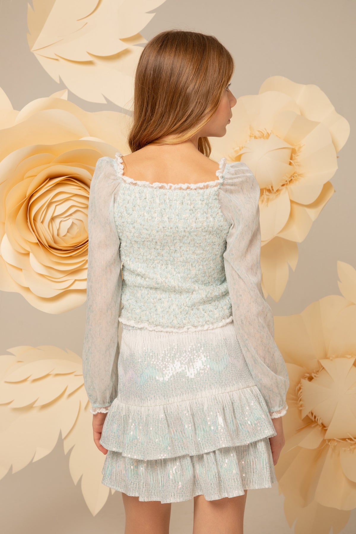 Back view of the layered sequin mini skirt