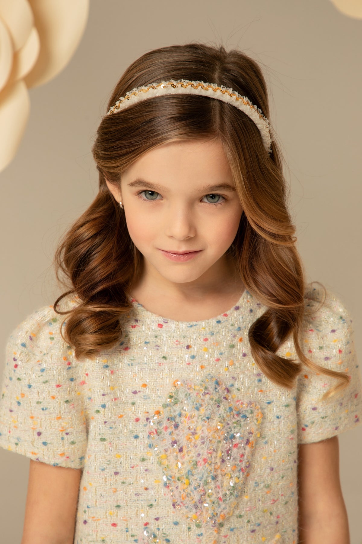 Cream tweed dress with a pastel flower appliqué