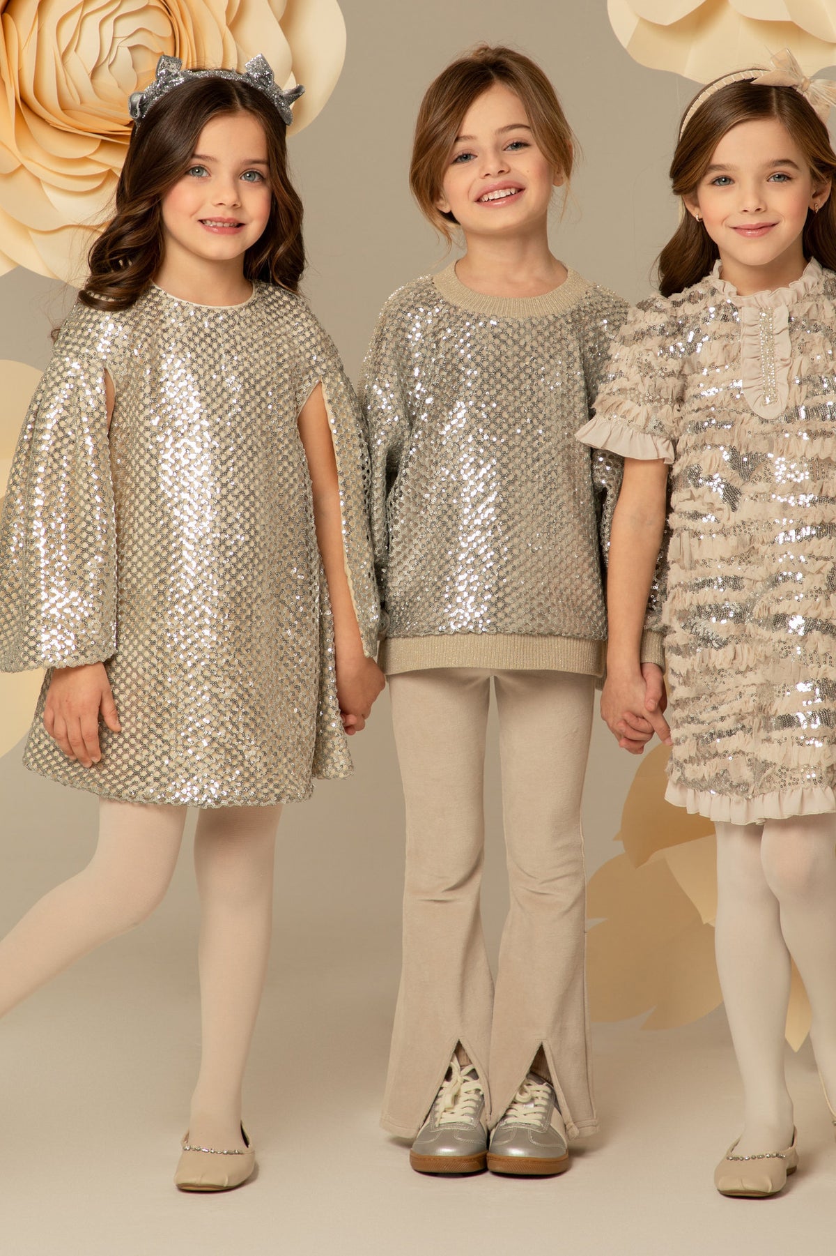 Group of girls in festive dresses from the EIRENE collection