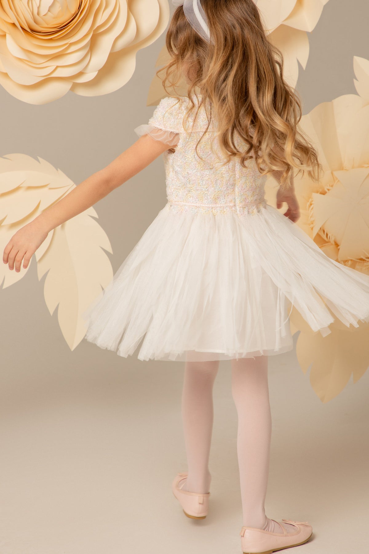 The tulle skirt in motion, seen from behind