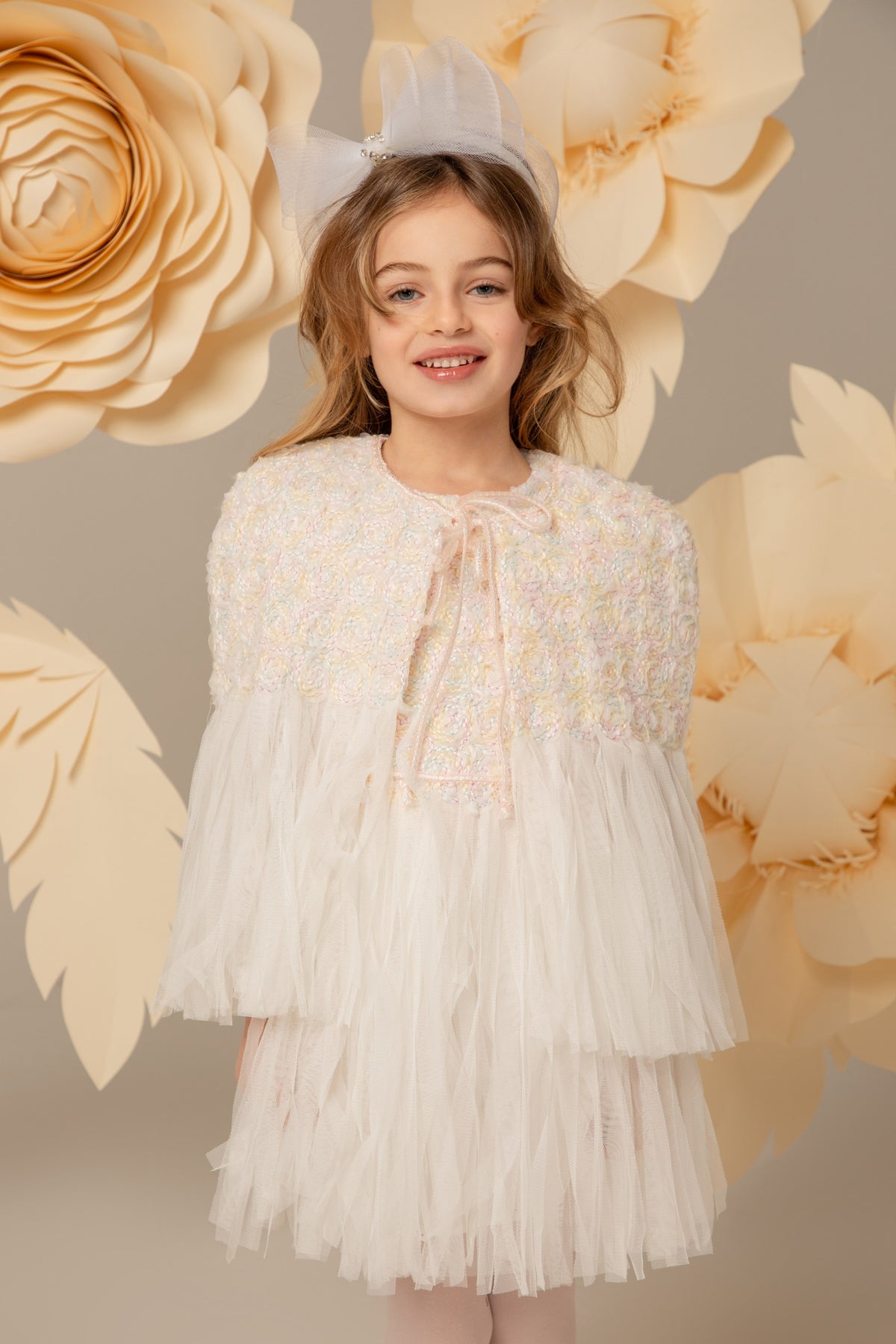 White structured lace cape with a ribbon tie