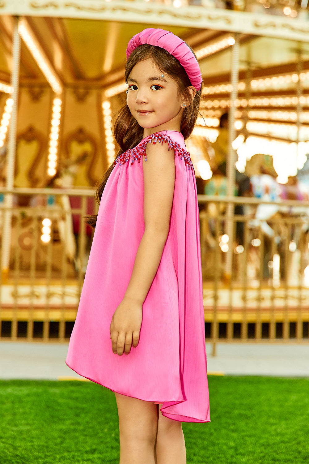 Fuchsia shiny asymmetrical dress with multicolor fringes