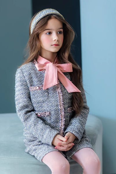 Grey and ivory jacket and shorts tweed set with matching grey and pink trimming and gold buttons